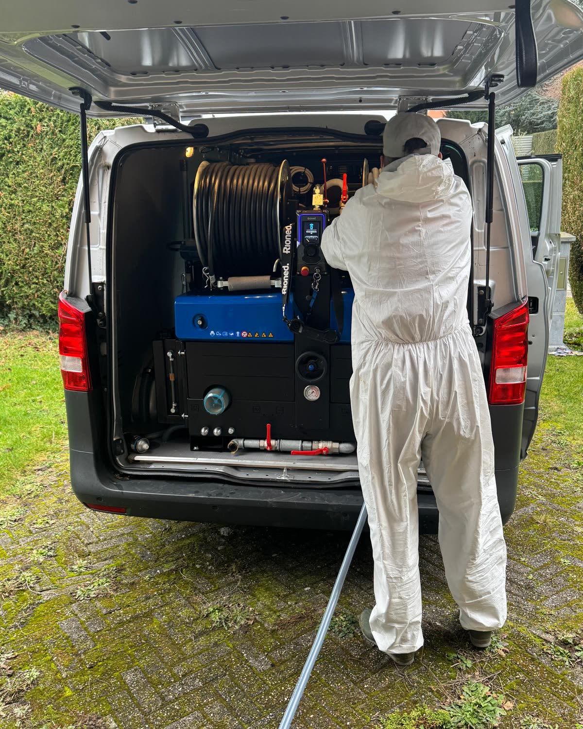 Rioned high-pressure jetting machine built into the back of the van.